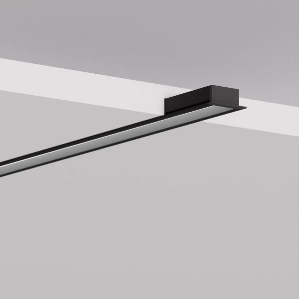 schwarze Einbauleiste lässt Möbel durch LED Beleuchtung glänzen